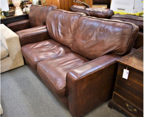 A brown leather two seater sofa with matching club chair (2) OPTION 