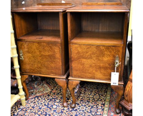 A matching pair of bedside tables with single shelf and cupboard on pad feet (38cm x 75cm high) 