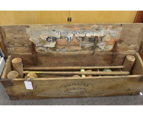A vintage T. H. Prosser and Sons croquet set in original wooden case. Includes three mallets (1 with head seperate) 5 balls p