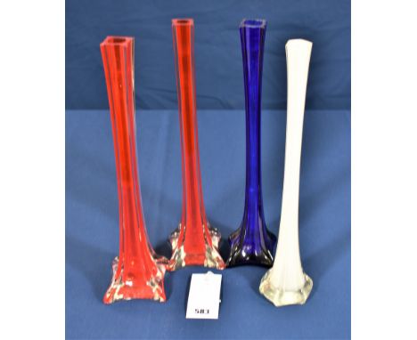 Four vintage coloured glass single stem specimen vases in red, blue and milk, the tallest 16in. (40.8cm.).  