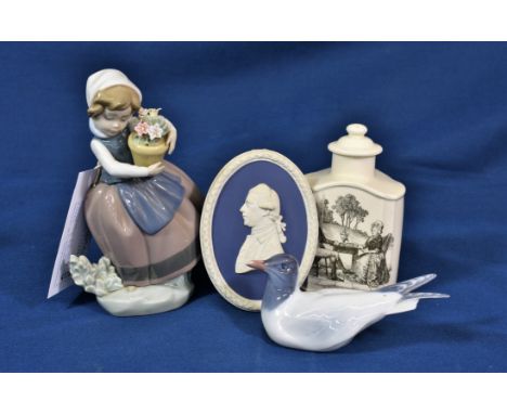 A Royal Copenhagen figure of a seagull no. 1468; together with a Lladro figure; an oval Wedgwood blue jasper ware portrait pl