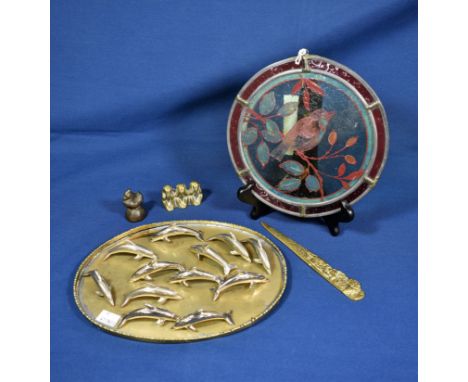 A Chinese bronze opium weight in the shape of a duck 5.2cm. high; together with a Chinese oval brass tray with engraved figur