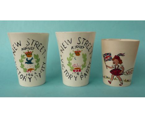 1945 World War II Peace: two Shelley beakers with painted decoration, some flaking and an English Bakelite beaker, 91mm (3)(c