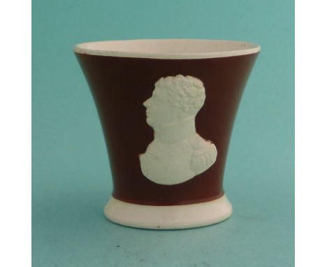 Marshal Michel Ney: a small pottery mug, the trumpet shaped body coloured brown and moulded with a white profile, with indist