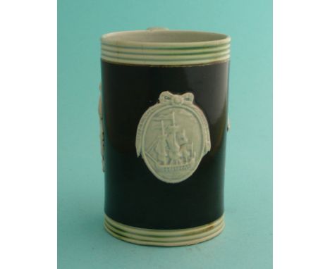 1782 Admiral Rodney and the Battle of the Saintes: an unusual pearlware mug of slender form, the foot, rim and handle with ti