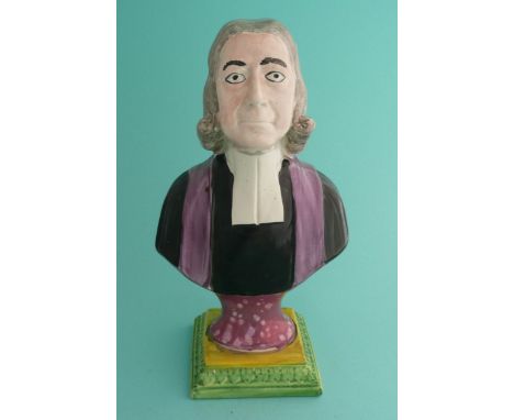 Rev John Wesley: a good pink lustre and particularly colourful portrait bust on moulded square base, circa 1820, 252mm(commem