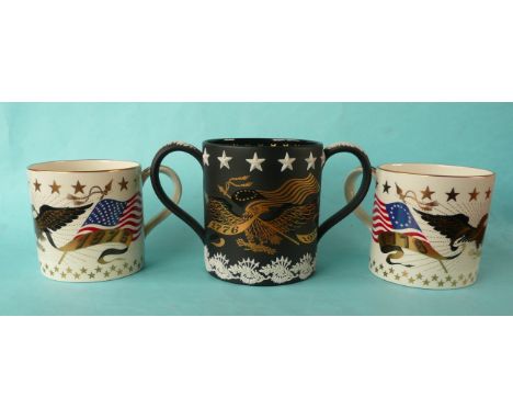 1976 American Bi-centenary: a Wedgwood black basalt loving cup applied in white and decorated in gilt, 128mm and two Wedgwood