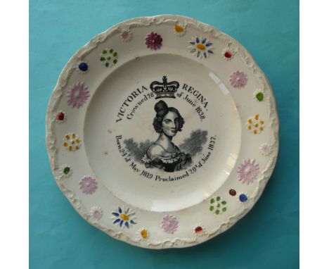 1838 Coronation: a potter plate with colourful moulded border printed in black with a named and dated portrait, 201mm(commemo