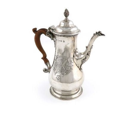 A George III silver coffee pot,by Thomas Wallis, London 1765, baluster form, engraved with an armorial within foliate mantlin