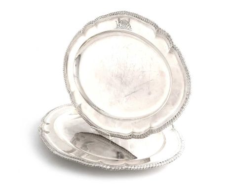 A pair of Victorian silver meat platters,by R & S Garrard & Co, London 1848,shaped oval form, gadroon border, engraved with a