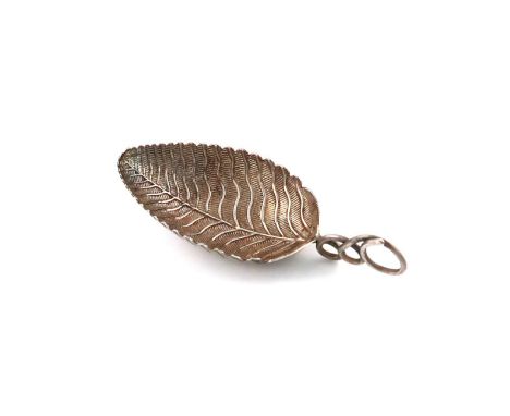 A George III silver caddy spoon,maker's mark only, E.M, for Elizabeth Morley, London circa 1800,leaf form, textured decoratio