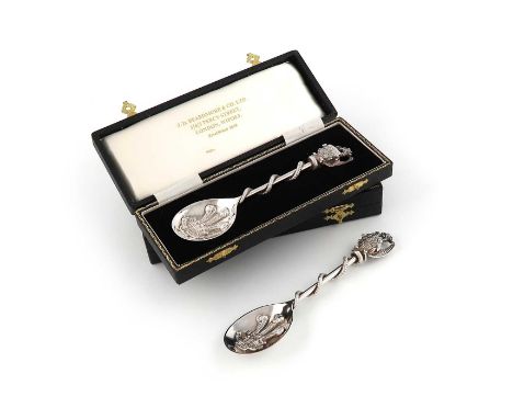 Designed by Norman Manwaring for J. D. Beardmore and Co., two modern silver commemorative spoons, Prince of Wales Investiture