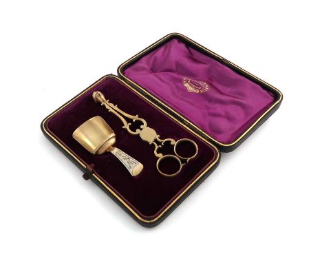 A George III silver-gilt caddy spoon and pair of 18th century silver-gilt sugar nips, by Joseph Taylor, Birmingham 1808, the 