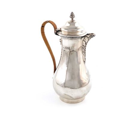 A silver hot water pot,by George Perkins, London 1912,baluster form, wicker-bound scroll handle, domed hinged cover with a co