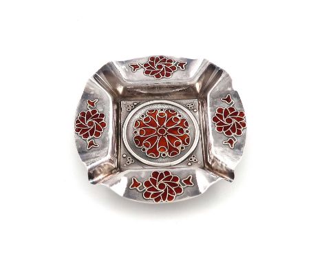 By John Ferguson Gow, an Arts and Crafts silver and enamel ashtray,London 1946,shaped circular form, with dark orange enamel 