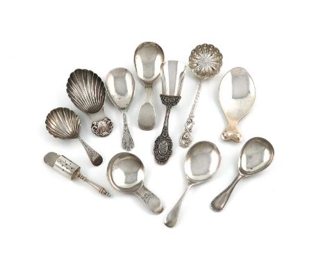 A collection of caddy spoons, various dates and makers, comprising silver items: one George III Fiddle pattern, Newcastle 180