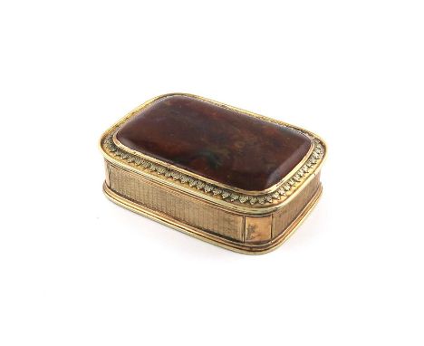 A 19th century silver-gilt mounted agate snuff box,unmarked, circa 1830,of rounded rectangular form, the hinged cover and bas