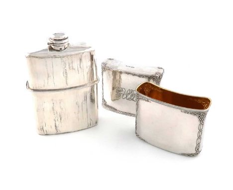 By Omar Ramsden, an Arts and Crafts silver hip flask,London 1924, also engraved 'OMAR RAMSDEN ME FECIT',shaped rectangular fo