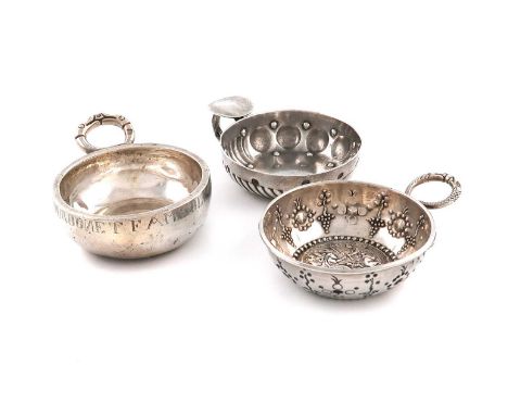 A small collection of French silver wine tasters,various dates and makers, comprising: an early 19th-century wine taster, mak