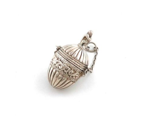 A Victorian silver vinaigrette,Birmingham 1888,ovoid form, part fluted and chased foliate decoration, the pull-off cover on a