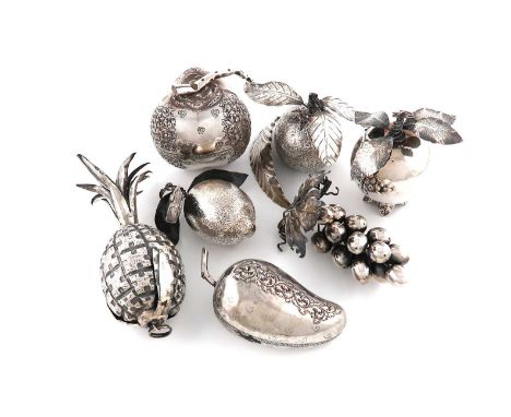 A collection of silver and metalware fruit, some Italian,comprising: one modelled as a pomegranate, a pineapple, an orange, a