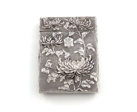 A 19th century Chinese silver card case,unmarked,rectangular form, embossed with chrysanthemum decoration on a matted backgro