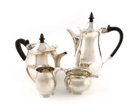 A modern four-piece silver tea set,by the Adie Brothers Ltd, Birmingham 1963,plain circular and baluster cape form, wooden sc