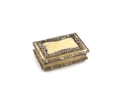 A Victorian silver-gilt snuff box,by Nathaniel Mills, Birmingham 1838,rectangular form, engine turned decoration to the sides