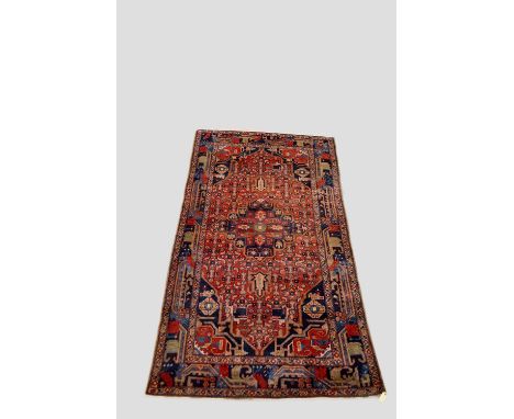 Hamadan carpet, north west Persia, mid-20th century, 9ft. 2in. x 4ft. 11in. 2.80m. x 1.50m. Patch to top left side field. 