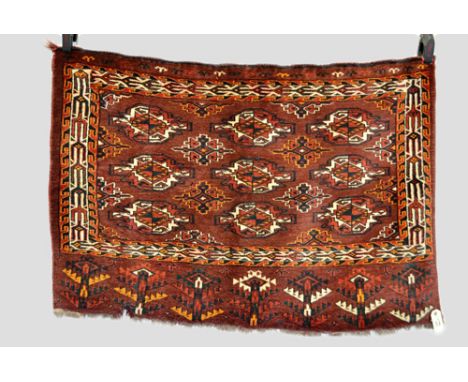 Yomut Turkmen 3 x 3 gul chuval face, Turkmenistan, circa 1920s, 2ft. 5in. x 3ft. 7in. 0.74m. x 1.09m. Closing loops to top ed