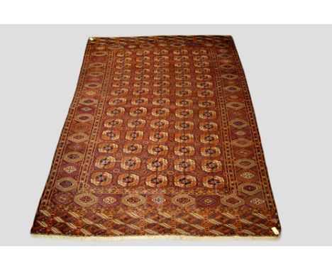 Tekke Turkmen 5 x 14 gul main carpet, Turkmenistan, circa 1920s, 10ft. 1in. x 6ft. 10in. Overall wear and crease marks and sm