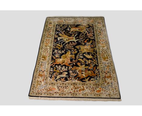 Fine silk carpet of classic hunting design, Egypt, second half 20th century, 8ft. 11in. x 6ft. 11in. 2.72m. x 2.11m. Beautifu