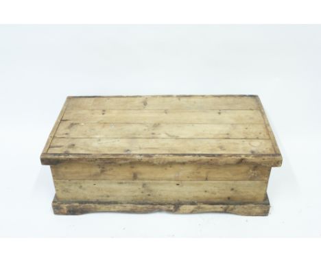 A pine trunk, with a detachable top, 34cm high, 101cm long, 53cm wide