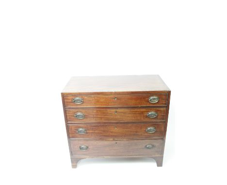 A 19th century mahogany chest of drawers, on bracket feet, with brass handles and embossed shooting scene, 83cm high, 91cm lo