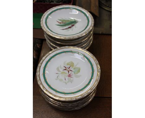 A set of four Royal Worcester cake stand, along with fourteen matching cabinet plates, each with hand painted leaves