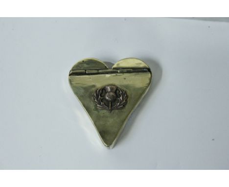 19th century brass snuff box in the form of heart, with an applied thistle