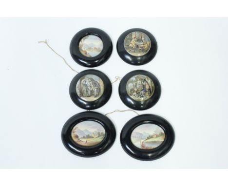 Three 20th century hand painted landscape scenes, each on a ceramic plaque and a black ebony frame, along with three mounted 