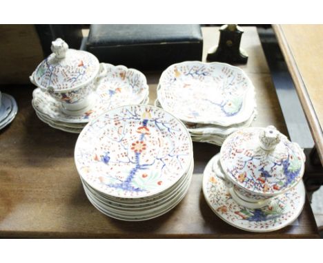 A 19th century Crown Derby part service, comprising nine dinner plates, four shell dishes, three overall serving dishes, two 