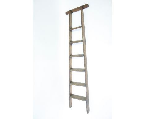 A Victorian pine library ladder