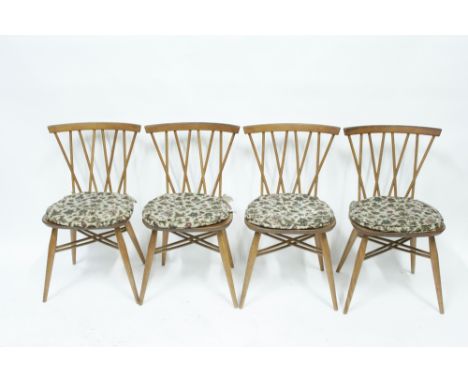 A set of four Ercol Chiltern pattern elm and oak chairs