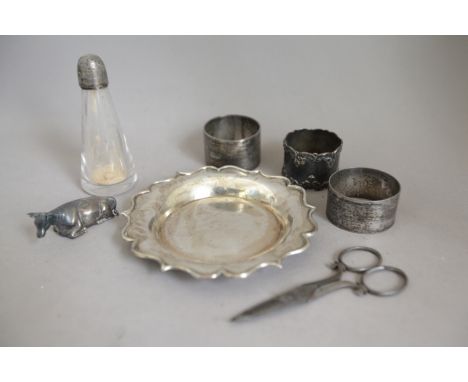 Silver: Butter Dish Finial (cow), Three Napkin Rings, Small Dish, Glass Pepper and Pair of Steel Scissors