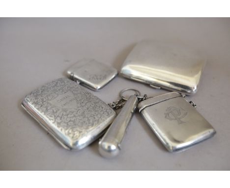 Silver Two Cigarette Cases, Vesta Case, Lighter and a Holder (5)