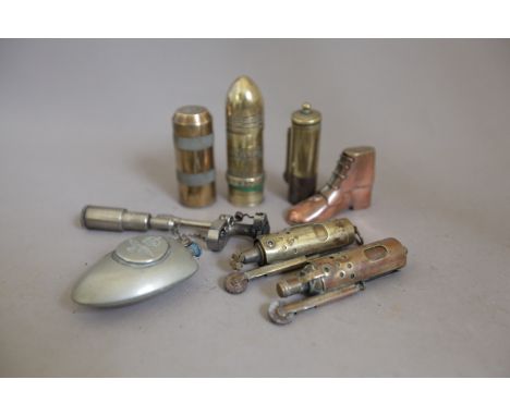 Copper 'Boot' Lighter, RAF Badge Lighter and Six Various Patent Lighters (8)