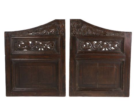 Rare pair of Charles II oak stair gates, Yorkshire circa 1680, each with downswept top rail above a carved long leaf terminat