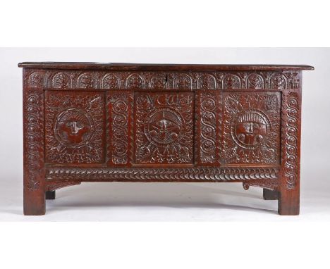 A rare Charles II oak coffer, West Country, dated 1661, having a quadruple-panelled lid, the front of three panels, each unus