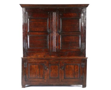 William and Mary oak clothes press, circa 1690/1700, North Country, the concave cornice above a pair of double fielded panel 