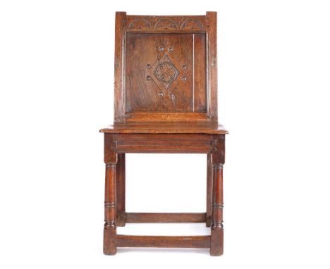 A rare Charles I joined oak closed-back side chair, Salisbury, and the surrounding area, circa 1630, the back panel carved wi