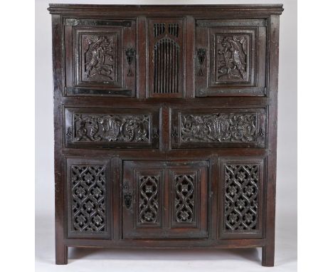 An impressive early 16th Century joined oak Great Hall cupboard, circa 1500-20, the front following a traditional arrangement