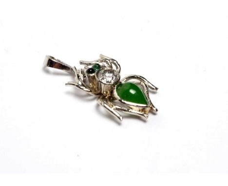 A jade and diamond spider pendant, the brilliant cut diamond weighing approximately 0.25 carats, in white metal mount, 2.6cms