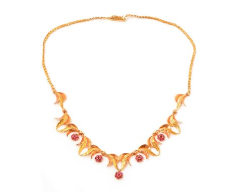 A ruby and 18ct yellow gold necklace, with two tones of yellow gold in feather design, set with five ruby clusters, on a deco